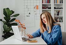 photo of woman on computer